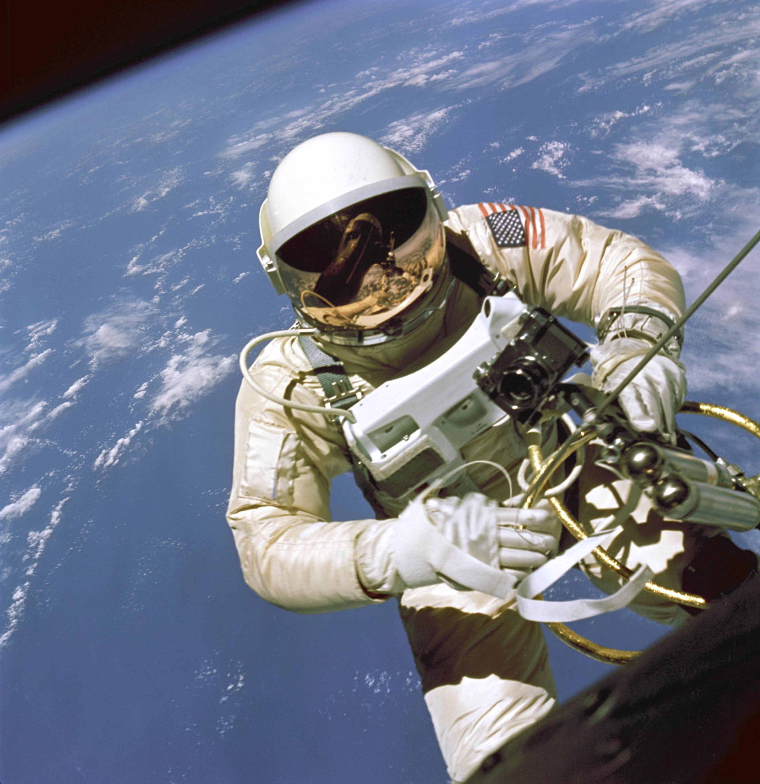 The historic first photograph of man in space: Ed White spacewalking over Hawaii during the first American EVA