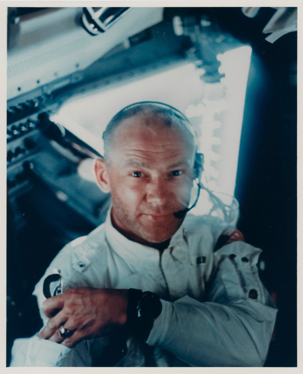 Buzz Aldrin weightless inside the LM Eagle during the outbound journey to the Moon