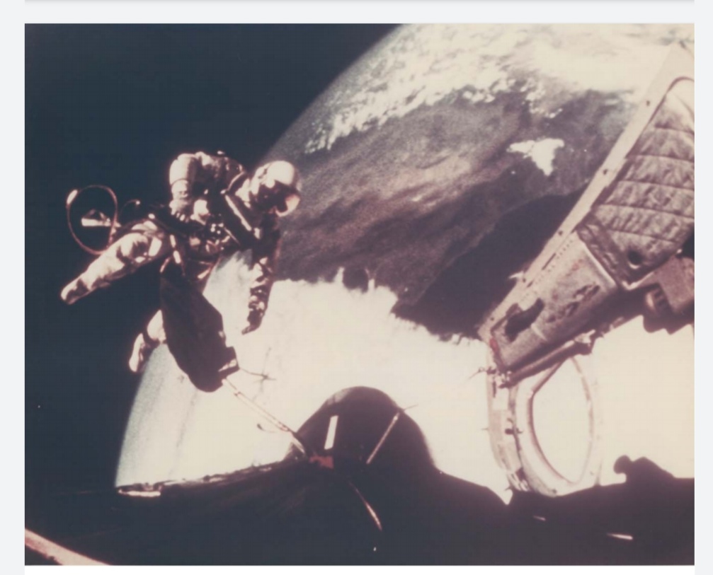 First US Spacewalk: views of Ed White returning to the spacecraft at the end of the EVA